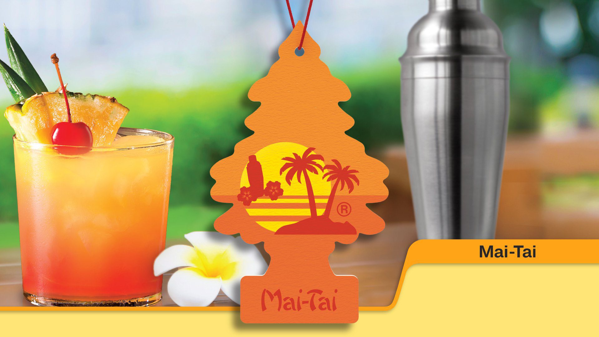 A Mai-Tai air freshener with a tropical beach scene and palm trees.